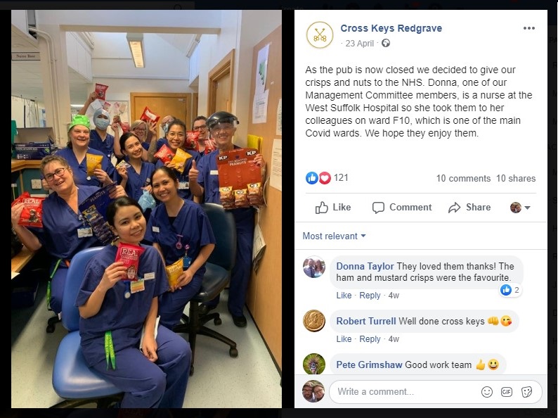 image showing NHS workers from the critical care team at Ipswich hospital receiving donated snacks from the Cross Keys pub, Redgrave