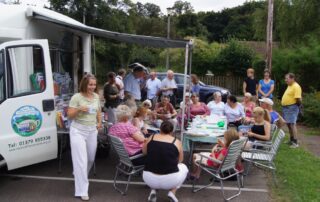 photo of Rural Coffee Caravan visit in action