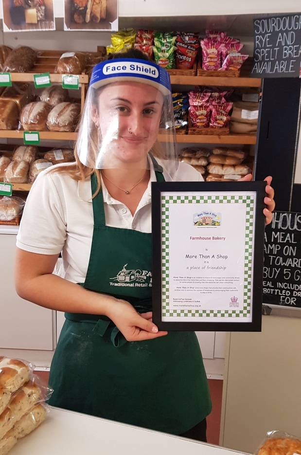 Farmhouse Bakery receiving their More Than A Shop certificate