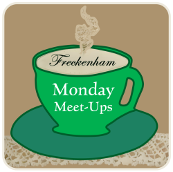 logo for Freckenaham Monday Meet Ups - an image of green teacup and saucer on a strip of lace with a coffee coloured background