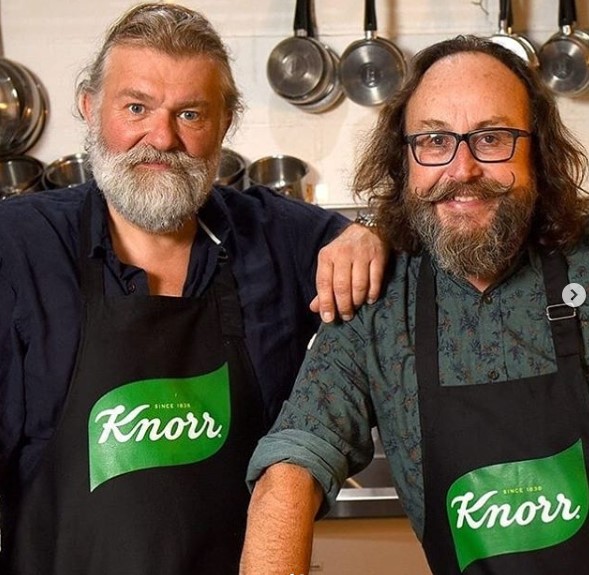 promotion shot of The Hairy Bikers in Knorr aprons to advertise their live cook-a-long on Monday 25th May 2020