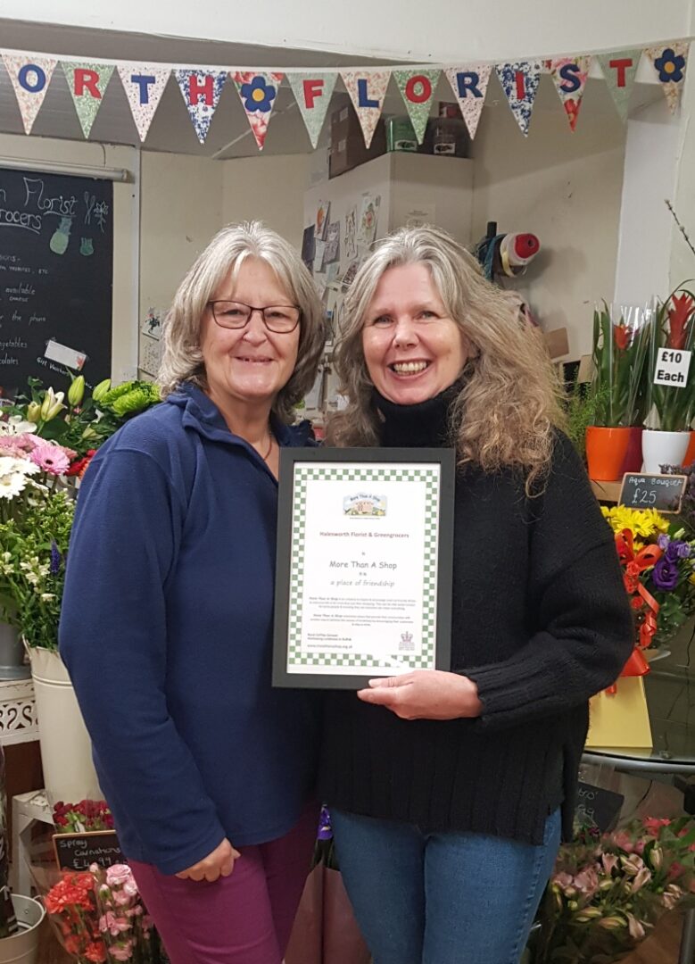 Halesworth Florist receiving their More Than A Shop certificate