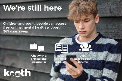 Kooth poster of young person checking their phone