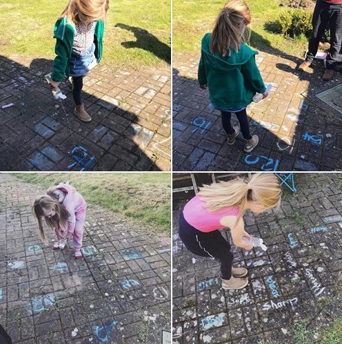 four images of child playing outdoor maths game with squirty water bottle and chalked numbers on the ground