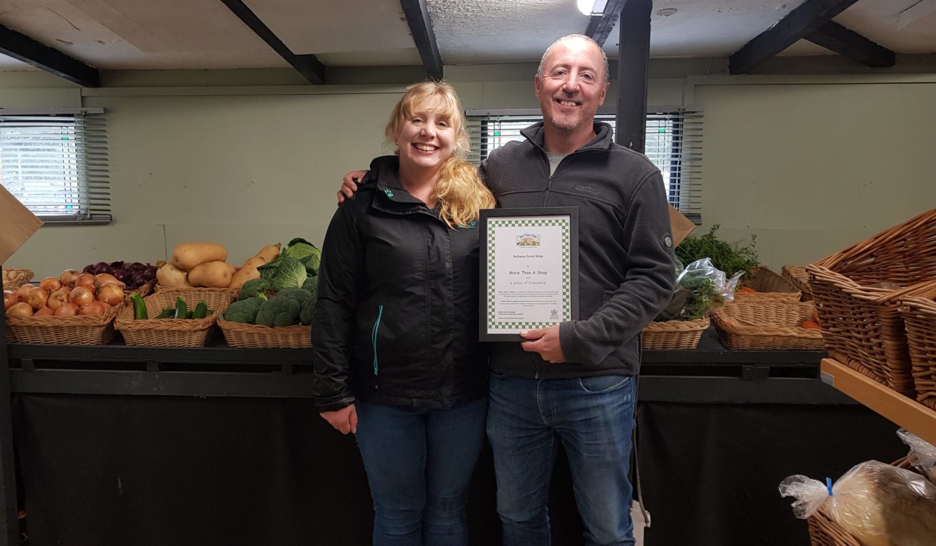 Railway Farm shop Kerry and Martin receiving their certificate
