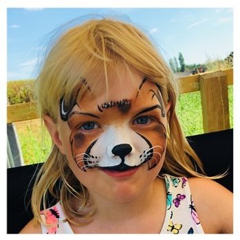 photo of child face painted to look like a dog, by Rooblidoo