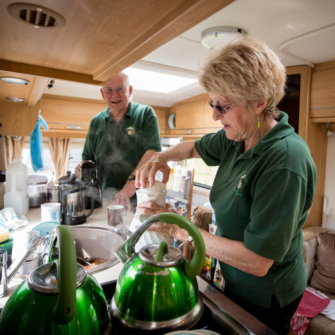 Volunteers serving refreshments for the Rural Coffee Caravan