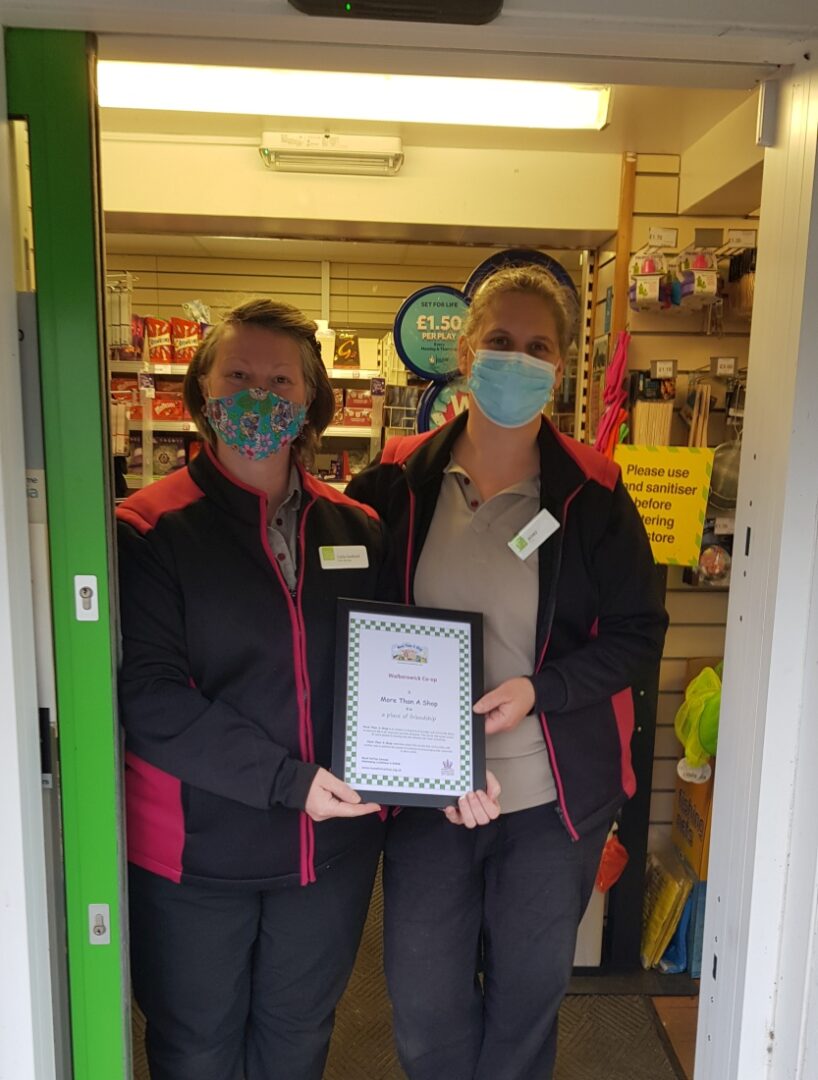 Walberswick Coop receiving their More Than A Shop certificate