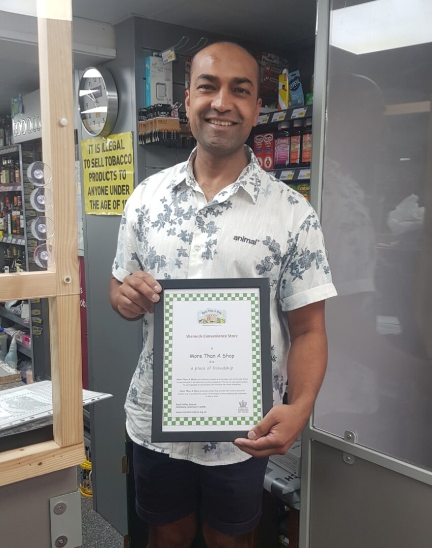 Warwick Convenince Store receiving their More Than A Shop certificate